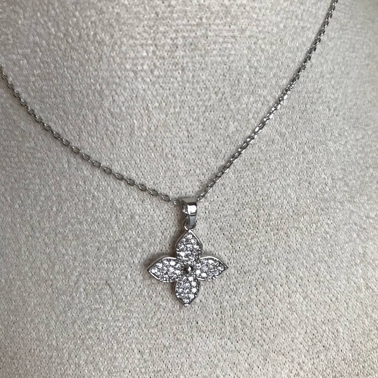 silver luck flower necklace